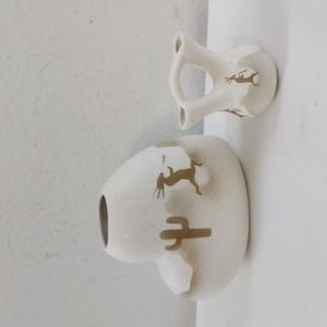 Source Unknown White and Brown Ceramic Vases